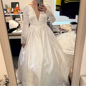 White Gown with Long Bishop Sleeves and Plunge Neckline for Bride